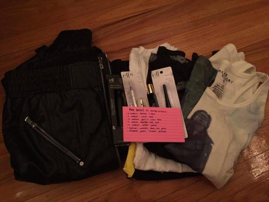 One of Luke's Care Packages consists of female clothing and makeup products with a note addressed to the receiver. 