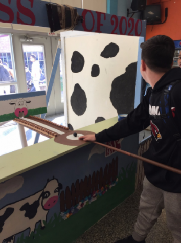 Pictured above are students playing the game at the freshman booth. 